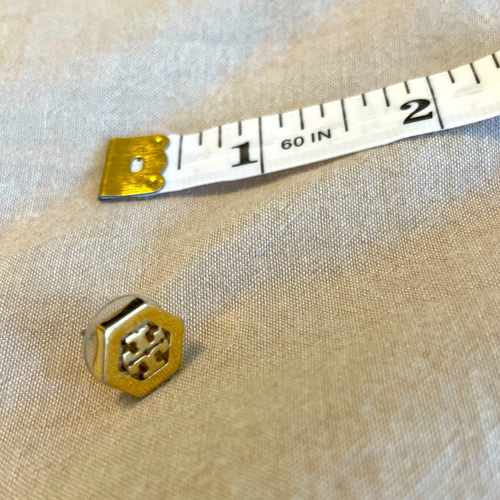 Tory Burch single gold earring